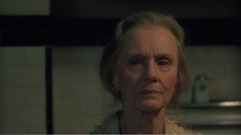 Movie still from “Driving Miss Daisy” (1989), directed by Bruce Beresford – An older woman with a very long hair; Close Up shot, Low angle