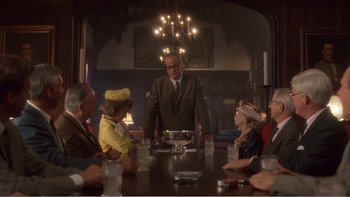 Movie still from “Driving Miss Daisy” (1989), directed by Bruce Beresford – A group of people sitting around a table; Wide shot, Over the shoulder angle
