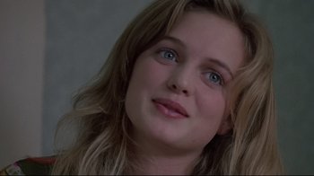 Movie still from “Drugstore Cowboy” (1989), directed by Gus Van Sant – A person with blue eyes; Close Up shot, Over the shoulder angle
