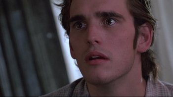 Movie still from “Drugstore Cowboy” (1989), directed by Gus Van Sant – A person looking at the camera; Close Up shot, Low angle