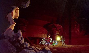 Movie still from “DuckTales the Movie: Treasure of the Lost Lamp” (1990), directed by Bob Hathcock – A group of people standing in a dark room; Wide shot, Low angle