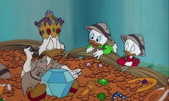 Movie still from “DuckTales the Movie: Treasure of the Lost Lamp” (1990), directed by Bob Hathcock – A group of cartoon characters sitting on top of coins; Medium shot, High angle