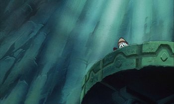 Movie still from “DuckTales the Movie: Treasure of the Lost Lamp” (1990), directed by Bob Hathcock – View of a castle in the middle of the sea; Extreme Wide shot, High angle