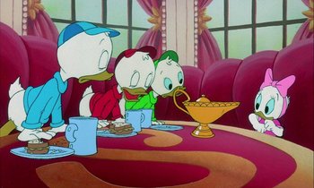 Movie still from “DuckTales the Movie: Treasure of the Lost Lamp” (1990), directed by Bob Hathcock – A group of cartoon characters sitting around a table; Medium shot, High angle