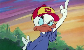 Movie still from “DuckTales the Movie: Treasure of the Lost Lamp” (1990), directed by Bob Hathcock – A cartoon duck with a hat on; Close Up shot, Low angle