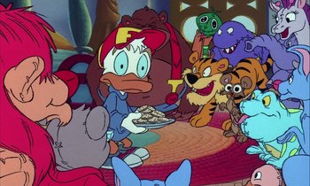 Movie still from “DuckTales the Movie: Treasure of the Lost Lamp” (1990), directed by Bob Hathcock – A group of cartoon characters gathered around a table; Wide shot, High angle