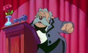 Movie still from “DuckTales the Movie: Treasure of the Lost Lamp” (1990), directed by Bob Hathcock – An old man with a mustache is speaking at a podium; Medium shot, Low angle