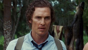 Movie still from “The Paperboy” (2012), directed by Lee Daniels – Matthew mcconaughey in a scene from the movie mud; Close Up shot, Over the shoulder angle