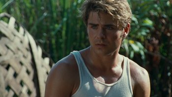 Movie still from “The Paperboy” (2012), directed by Lee Daniels – A person wearing a white shirt; Close Up shot, Over the shoulder angle