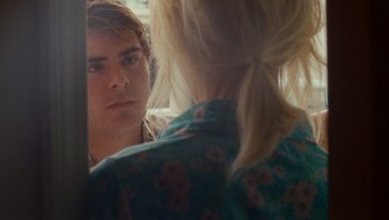Movie still from “The Paperboy” (2012), directed by Lee Daniels – A man and a woman looking at each other in a mirror; Close Up shot, Over the shoulder angle