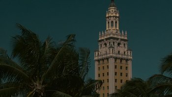 Movie still from “The Paperboy” (2012), directed by Lee Daniels – A tall tower with a clock on the top of it; Extreme Wide shot, Low angle