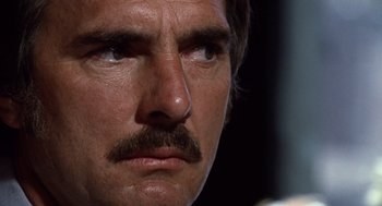 Movie still from “Duel” (1971), directed by Steven Spielberg – A man with a mustache; Close Up shot, Low angle