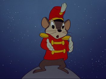 Movie still from “Dumbo” (1941), directed by Ben Sharpsteen – A cartoon of a mouse in a red uniform; Medium shot, Low angle