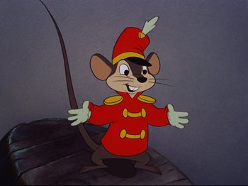 Movie still from “Dumbo” (1941), directed by Ben Sharpsteen – A cartoon of a mouse in a red outfit; Medium shot, Low angle