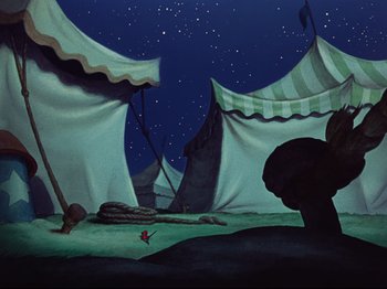 Movie still from “Dumbo” (1941), directed by Ben Sharpsteen – An animated scene of a tent city in the night sky; Extreme Wide shot, Low angle
