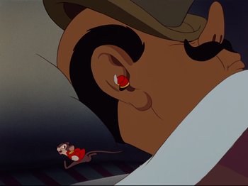 Movie still from “Dumbo” (1941), directed by Ben Sharpsteen – An animated picture of a man with a mouse in his ear; Extreme Close Up shot, High angle