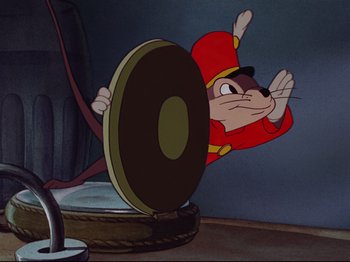 Movie still from “Dumbo” (1941), directed by Ben Sharpsteen – A picture of a character in a cartoon setting; Wide shot, Low angle