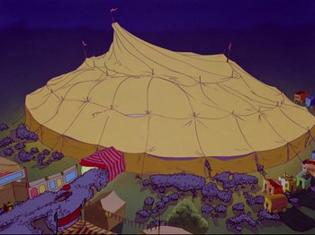 Movie still from “Dumbo” (1941), directed by Ben Sharpsteen – An illustration of a circus tent with a crowd of people in the background; Extreme Wide shot, High angle