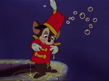 Movie still from “Dumbo” (1941), directed by Ben Sharpsteen – A cartoon of a mouse in a red outfit; Medium shot, Low angle