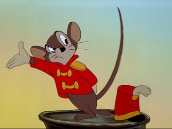 Movie still from “Dumbo” (1941), directed by Ben Sharpsteen – A cartoon of a mouse wearing a red jacket; Medium shot, Low angle