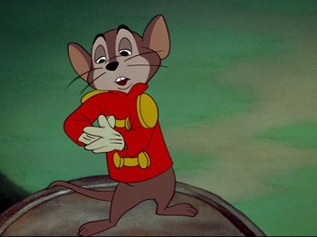 Movie still from “Dumbo” (1941), directed by Ben Sharpsteen – A cartoon of a mouse wearing a red jacket; Medium shot, Low angle