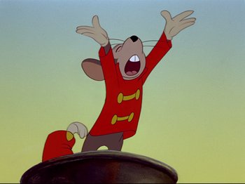 Movie still from “Dumbo” (1941), directed by Ben Sharpsteen – A cartoon of a mouse wearing a red outfit; Medium shot, Low angle