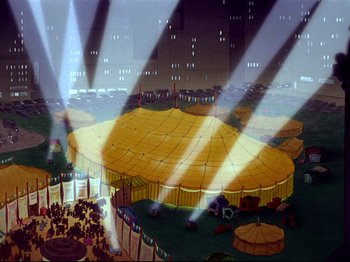 Movie still from “Dumbo” (1941), directed by Ben Sharpsteen – A circus tent with a crowd of people in it; Extreme Wide shot, High angle