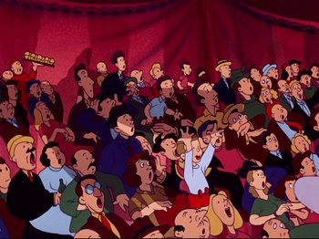 Movie still from “Dumbo” (1941), directed by Ben Sharpsteen – An audience of people sitting in a theater; Extreme Wide shot, High angle