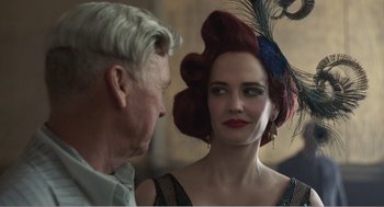 Movie still from “Dumbo” (2019), directed by Tim Burton – An older man and a young woman with red hair; Close Up shot, Over the shoulder angle