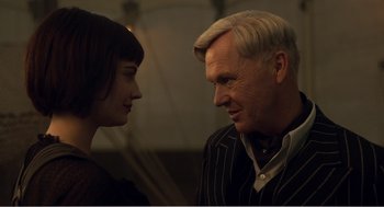 Movie still from “Dumbo” (2019), directed by Tim Burton – A man and a woman looking at one another; Close Up shot, Over the shoulder angle