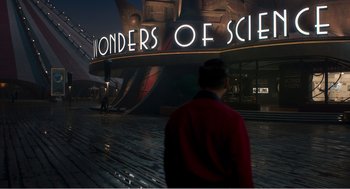 Movie still from “Dumbo” (2019), directed by Tim Burton – A man standing in front of a science museum; Extreme Wide shot, High angle
