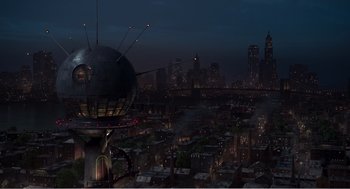 Movie still from “Dumbo” (2019), directed by Tim Burton – An aerial view of a city at night with lights on; Extreme Wide shot, Overhead angle
