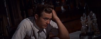 Movie still from “East of Eden” (1955), directed by Elia Kazan – A man in a white dress shirt and a tie; Close Up shot, Low angle