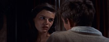 Movie still from “East of Eden” (1955), directed by Elia Kazan – A woman looking at a man in the mirror; Close Up shot, Over the shoulder angle