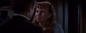 Movie still from “East of Eden” (1955), directed by Elia Kazan – A person talking to another person; Close Up shot, Over the shoulder angle
