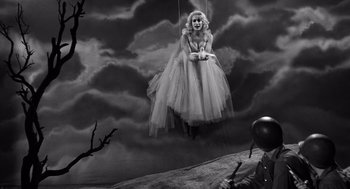 Movie still from “Ed Wood” (1994), directed by Tim Burton – A black - and - white photo of a woman on a swing; Wide shot, High angle