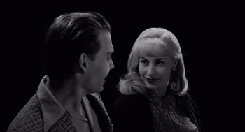Movie still from “Ed Wood” (1994), directed by Tim Burton – A man and a woman talking to each other; Close Up shot, Over the shoulder angle
