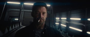 Movie still from “Eddie the Eagle” (2015), directed by Dexter Fletcher – A person with a cigarette in his mouth; Close Up shot, Low angle