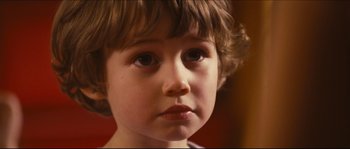 Movie still from “Eden Lake” (2008), directed by James Watkins – A young child's face; Close Up shot, Over the shoulder angle