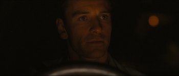 Movie still from “Eden Lake” (2008), directed by James Watkins – A person driving a car in the dark; Close Up shot, Over the shoulder angle