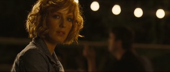 Movie still from “Eden Lake” (2008), directed by James Watkins – A person with short blonde hair; Close Up shot, Over the shoulder angle