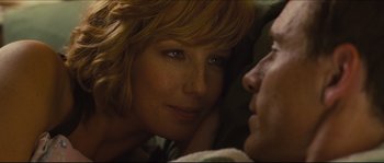 Movie still from “Eden Lake” (2008), directed by James Watkins – A woman's face and a man's face; Close Up shot, Over the shoulder angle