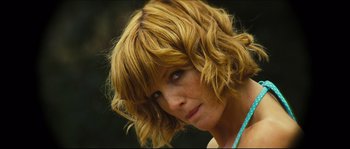 Movie still from “Eden Lake” (2008), directed by James Watkins – A person wearing a necklace; Close Up shot, Low angle