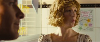 Movie still from “Eden Lake” (2008), directed by James Watkins – A person wearing a floral dress; Close Up shot, Low angle