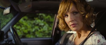Movie still from “Eden Lake” (2008), directed by James Watkins – A person sitting in a car; Close Up shot, Over the shoulder angle