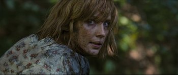Movie still from “Eden Lake” (2008), directed by James Watkins – A person with a face covered in dirt; Close Up shot, Low angle