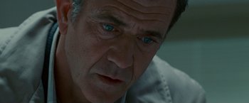 Movie still from “Edge of Darkness” (2010), directed by Martin Campbell – A person with blue eyes; Extreme Close Up shot, Low angle