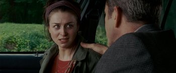 Movie still from “Edge of Darkness” (2010), directed by Martin Campbell – A man and a woman are talking to each other; Close Up shot, Over the shoulder angle