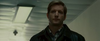 Movie still from “Edge of Darkness” (2010), directed by Martin Campbell – A person wearing a jacket; Close Up shot, Low angle