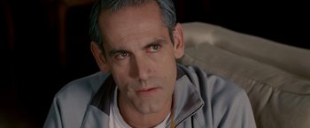 Movie still from “Edge of Darkness” (2010), directed by Martin Campbell – A person wearing a jacket and looking at the camera; Close Up shot, Over the shoulder angle